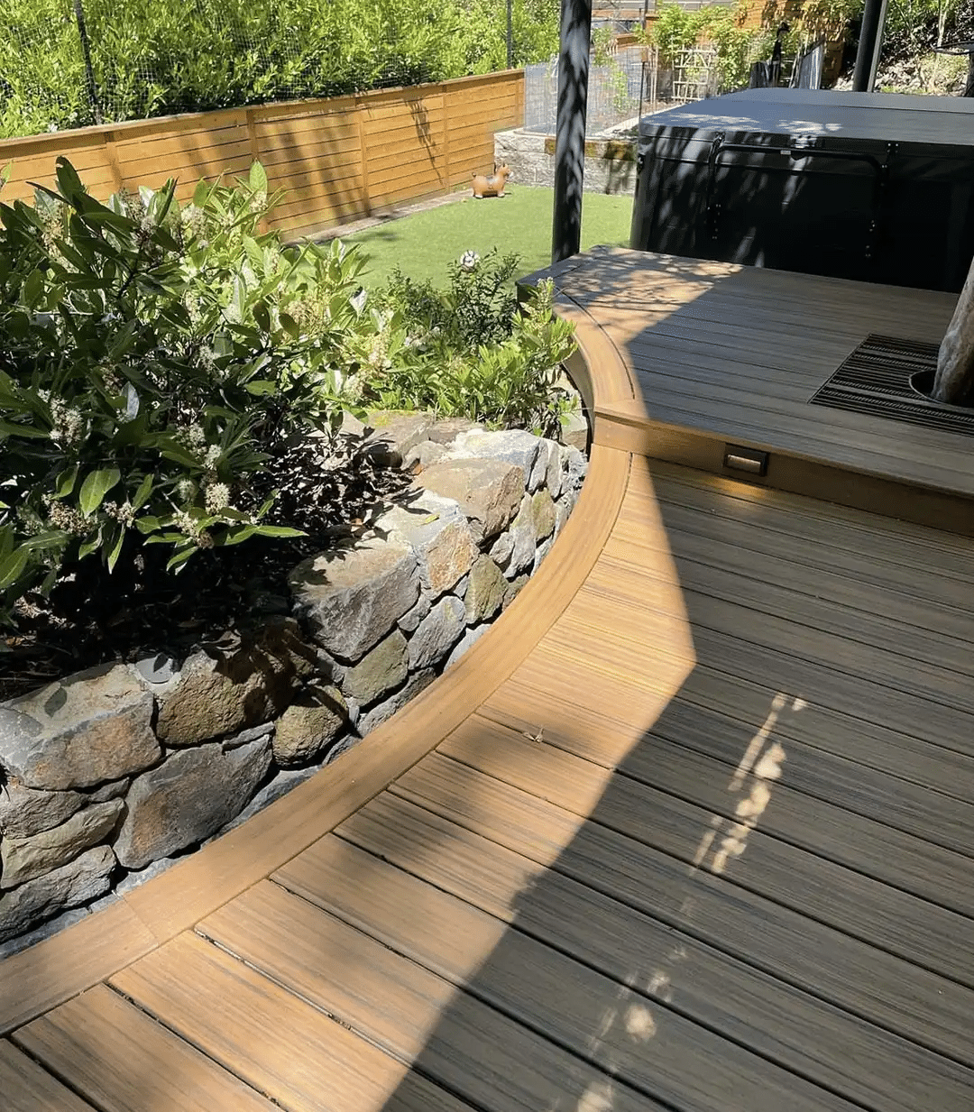 Curved deck with hot tub - Curved Composite deck builders in Portland OR