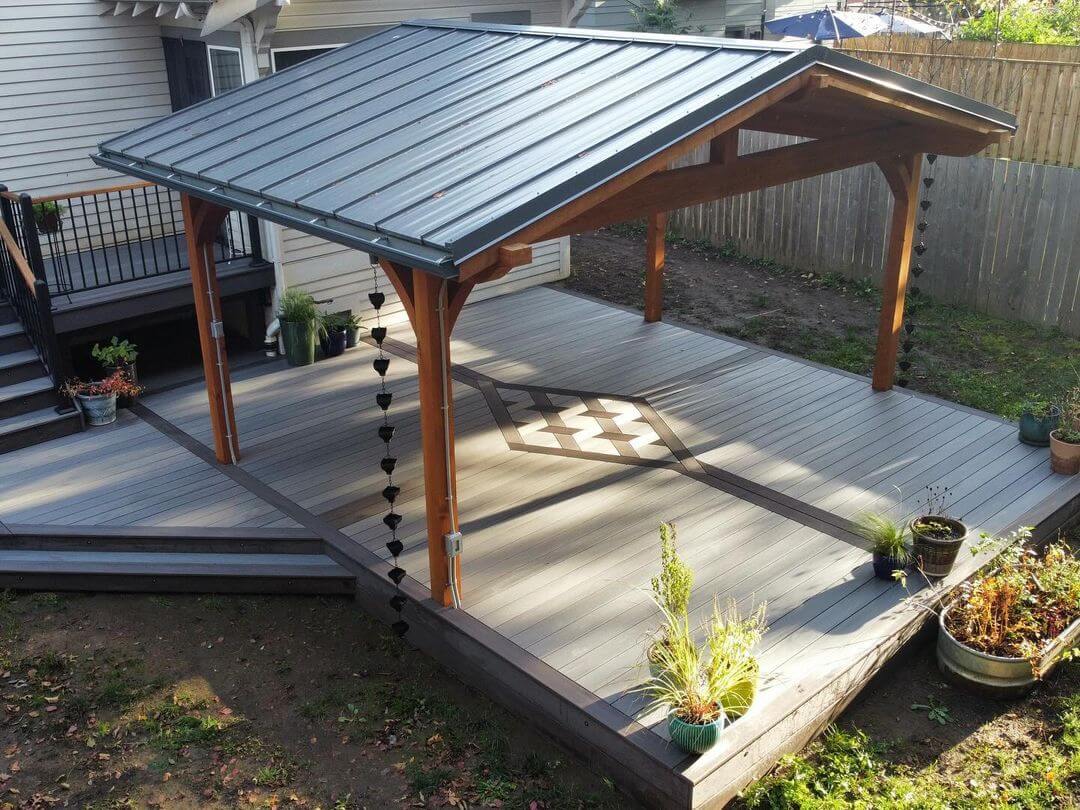 photo of a TimberTech deck by AZEK with a deck cover and deck inlay