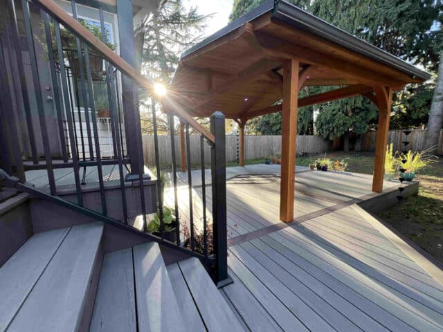 photo of multi-level deck with deck inlay and deck cover - Build a deck in winter