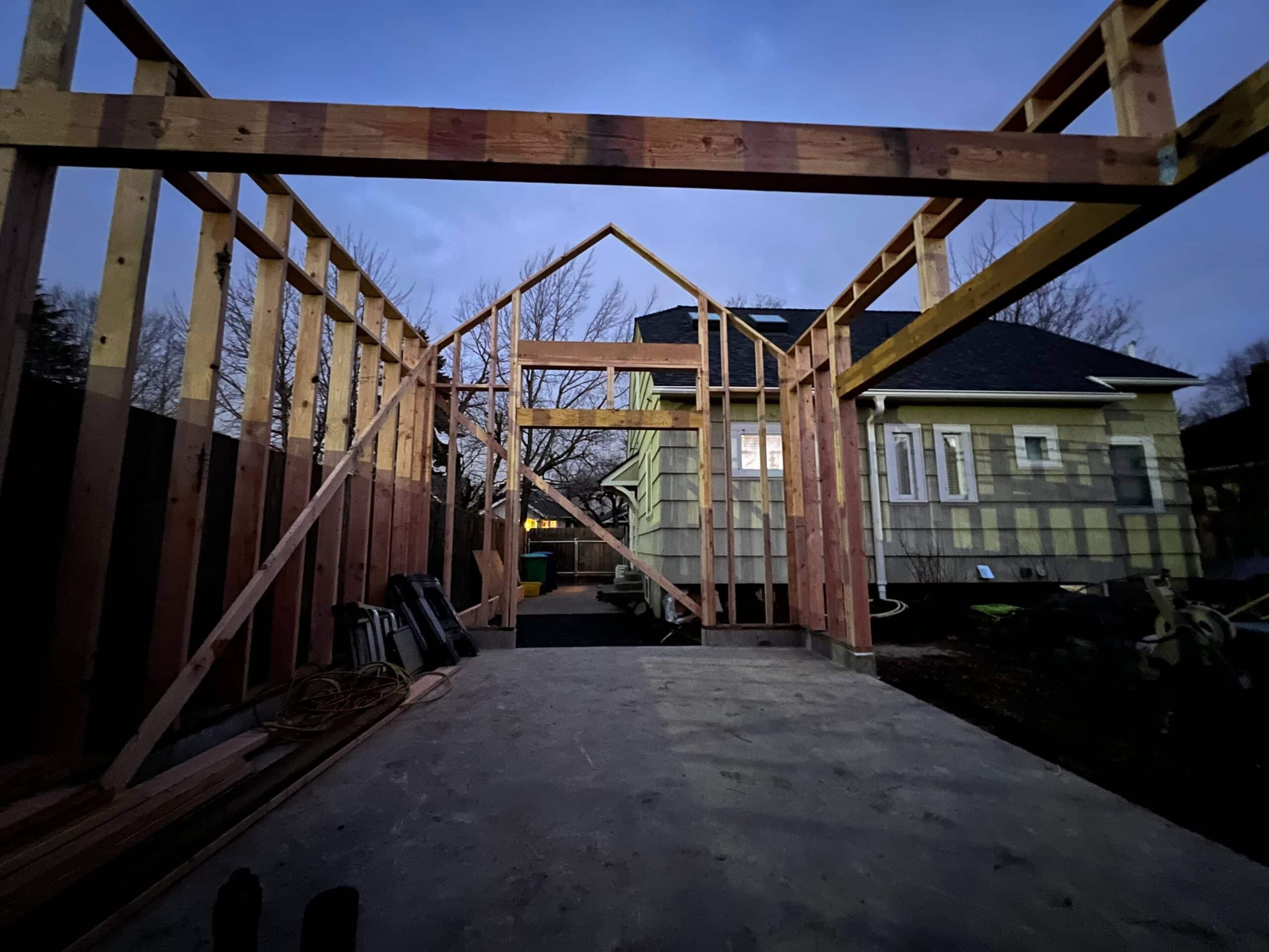 new garden house ADU being framed concrete slab foundation has been poured scaled