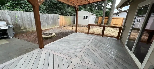 Photo of a backyard outdoor living project being constructed by Proper Built, a Portland, Ore., deck builder